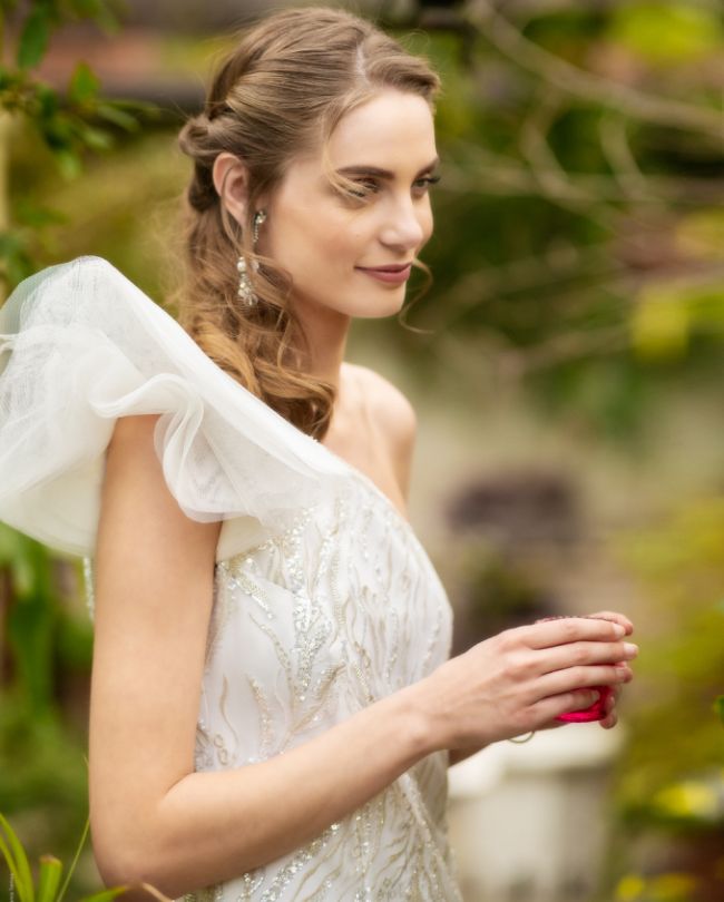 shine wedding dress woman holding red cup